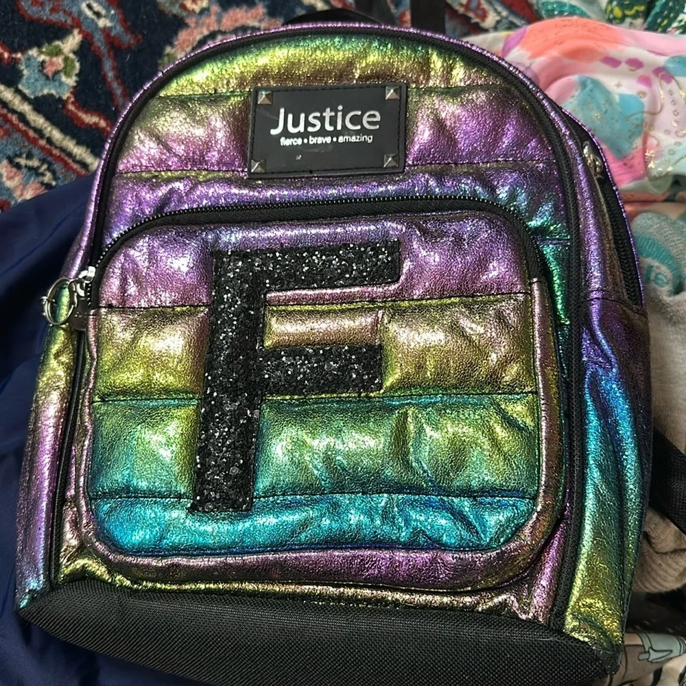 Justice Letter (F) fierce-brave-amazing iridescent color backpack EUC